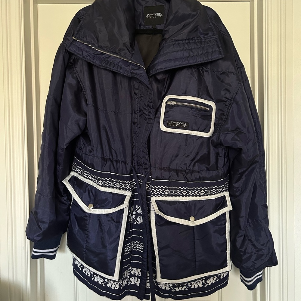 Blue Ski Jacket with Puffer Style and High Collar